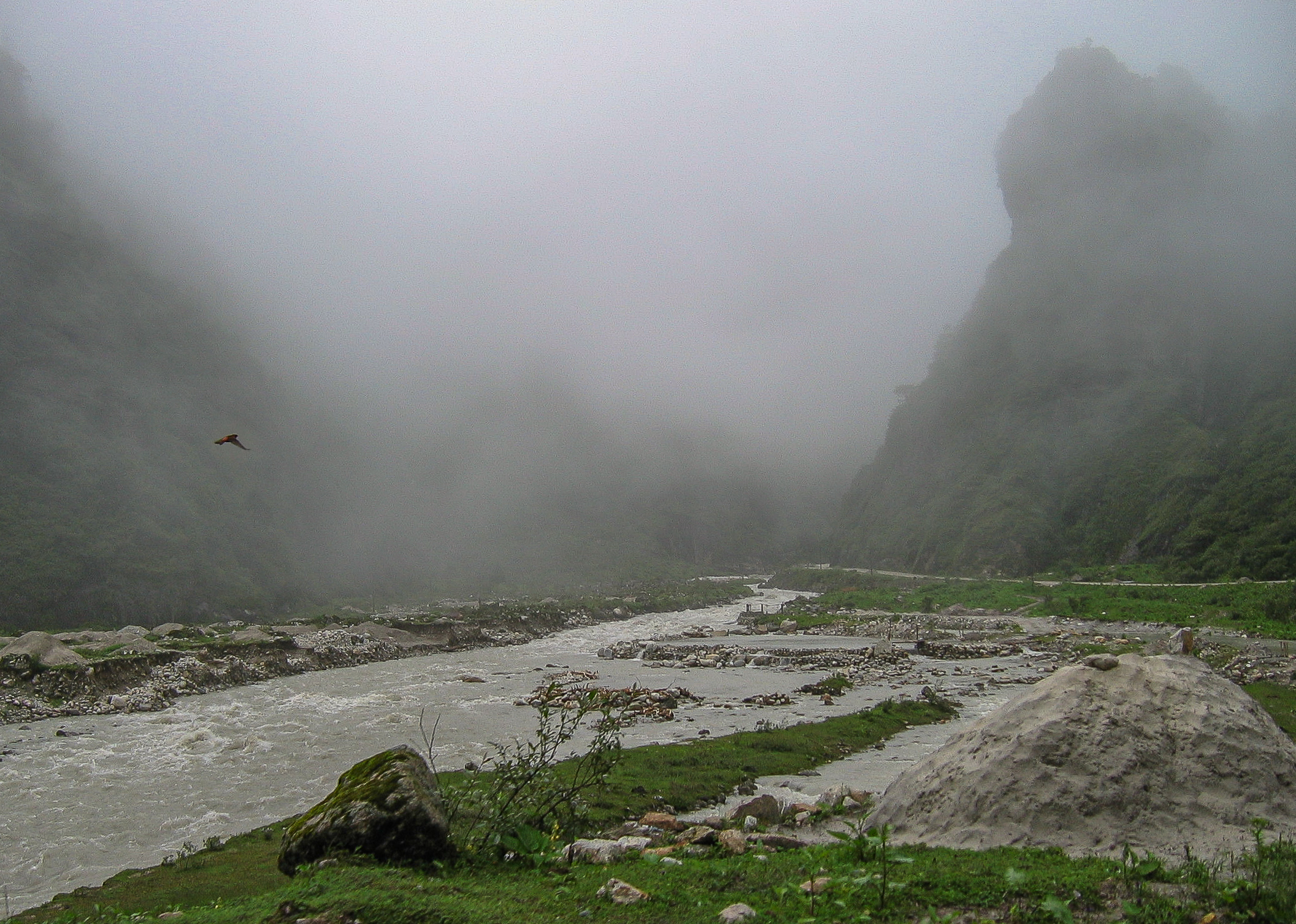 Kathmandu to Lhasa overland - Day 2. River, mountains, mist and a falcon on the way to Tingri, Tibet