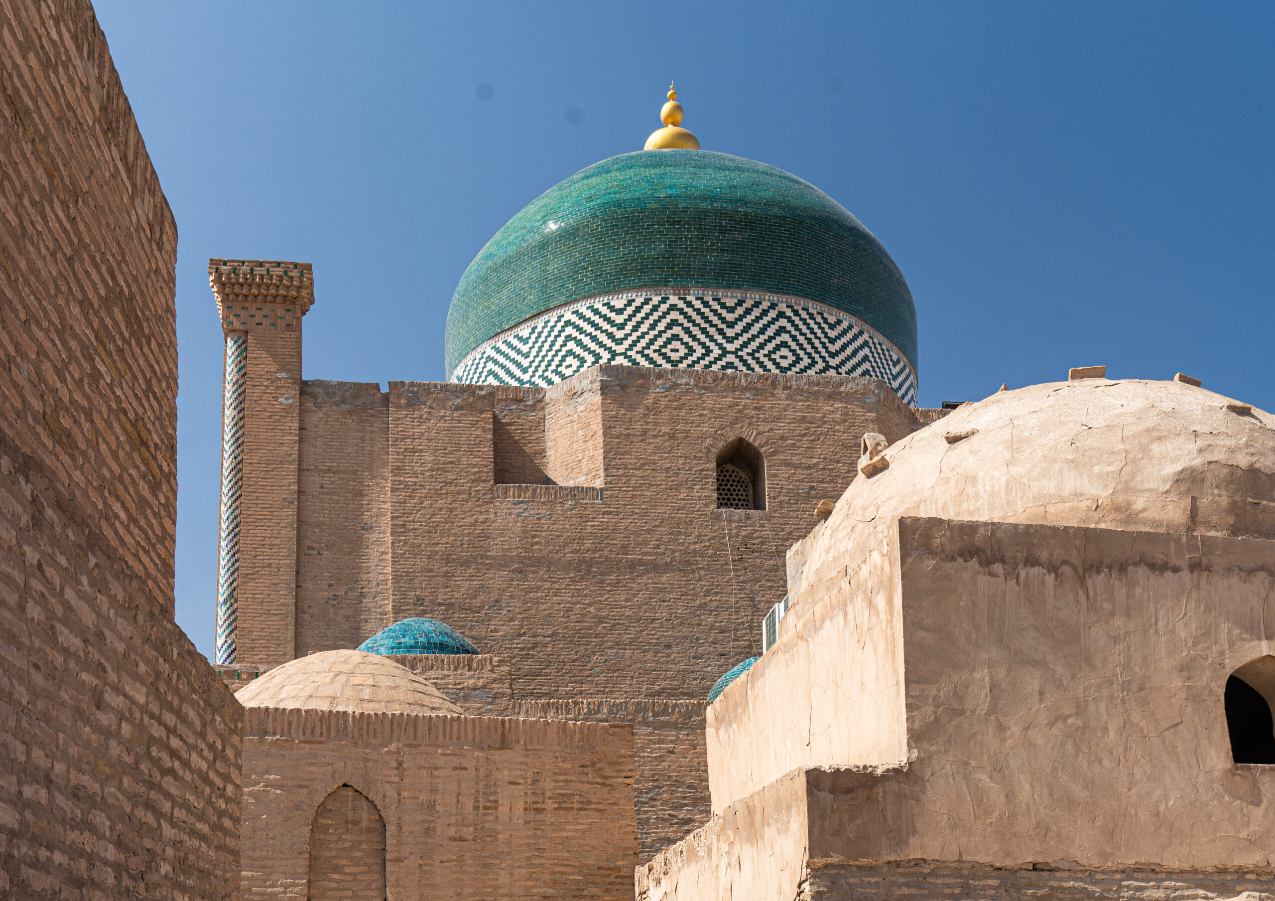 Khiva - Looking from a quiet corner towards the dome of the Pahlavon Mahmud Mausoleum 