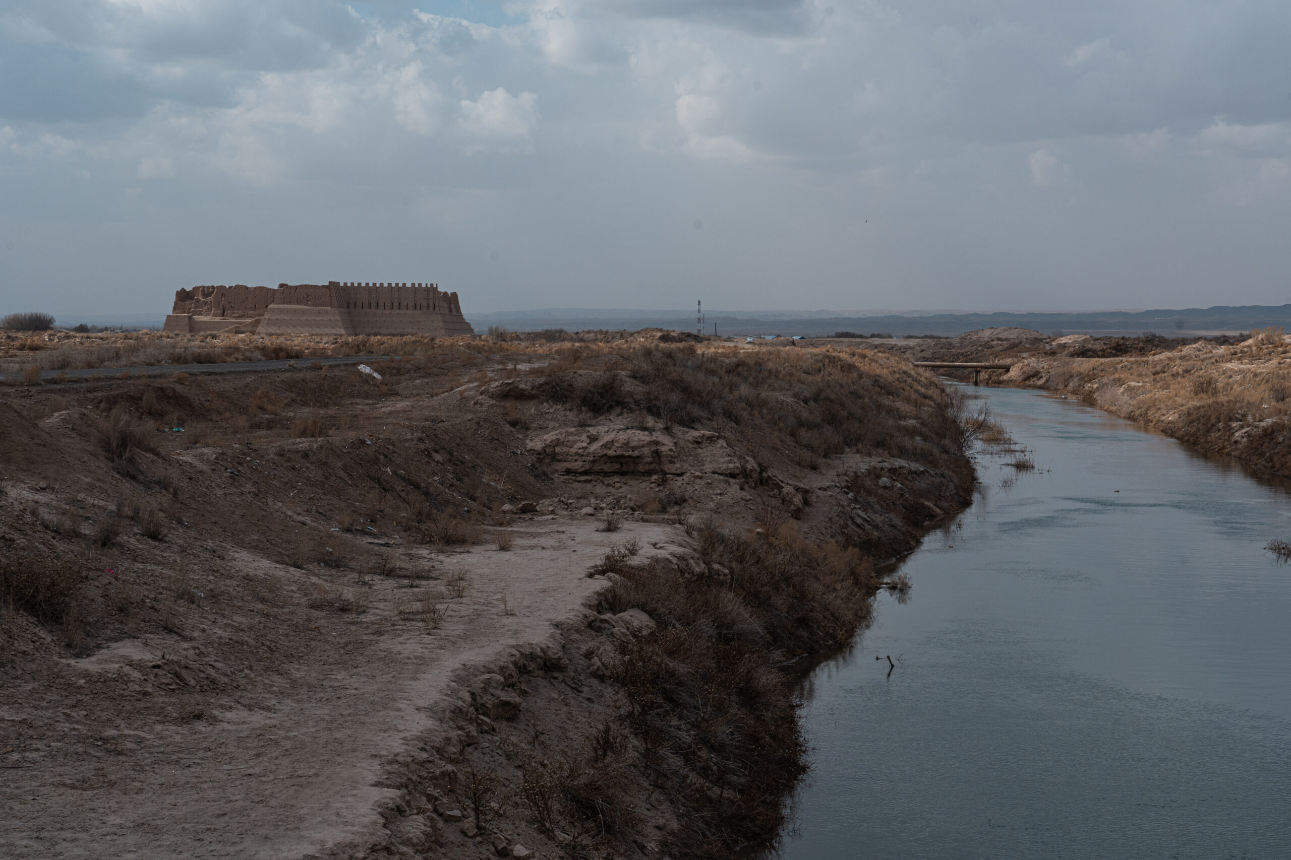 Uzbekistan - Karakalpakstan - Kyzyl Qala with a main irrigation canal alongside