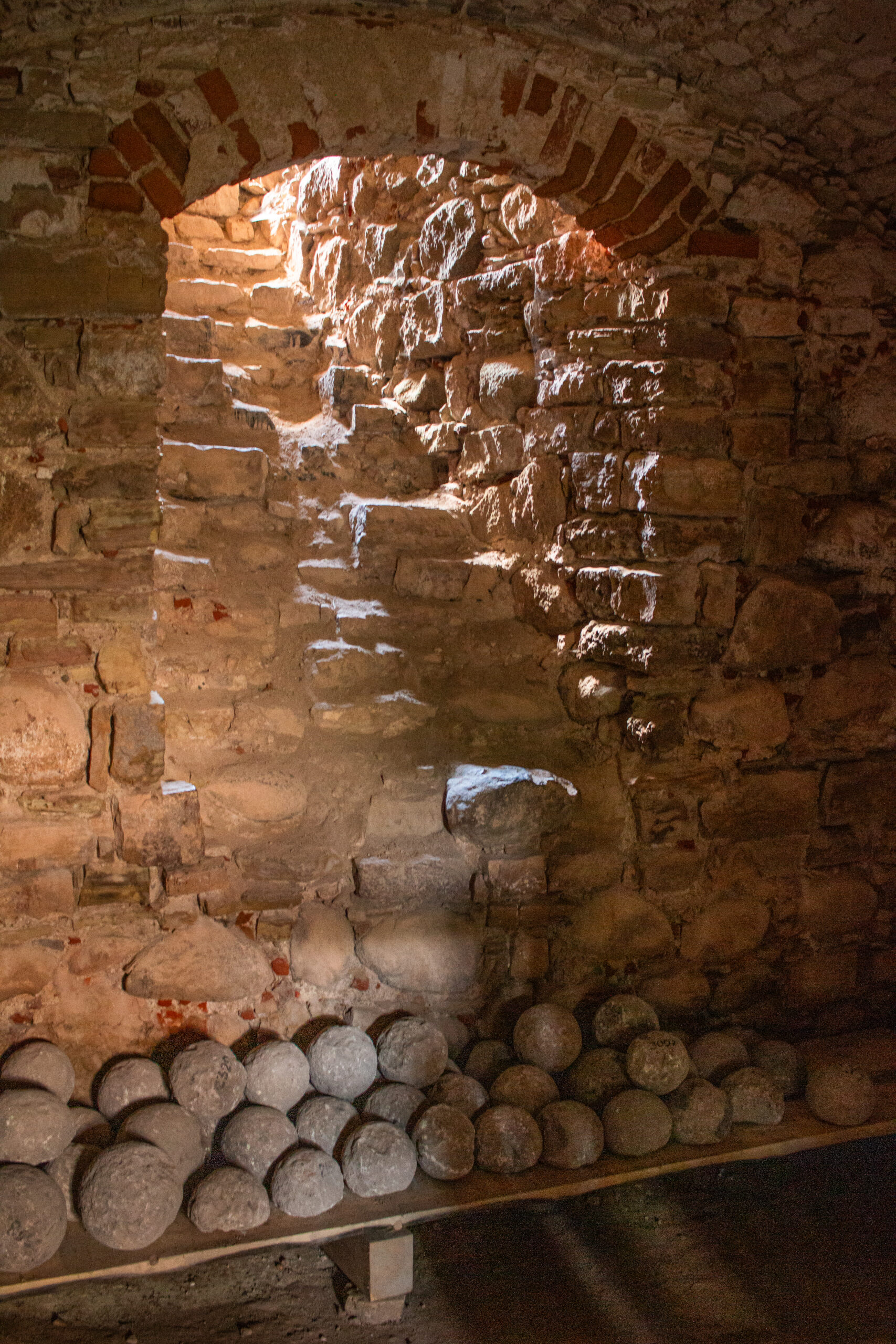 Latvia - Cesis Castle - Canon balls in the cellars