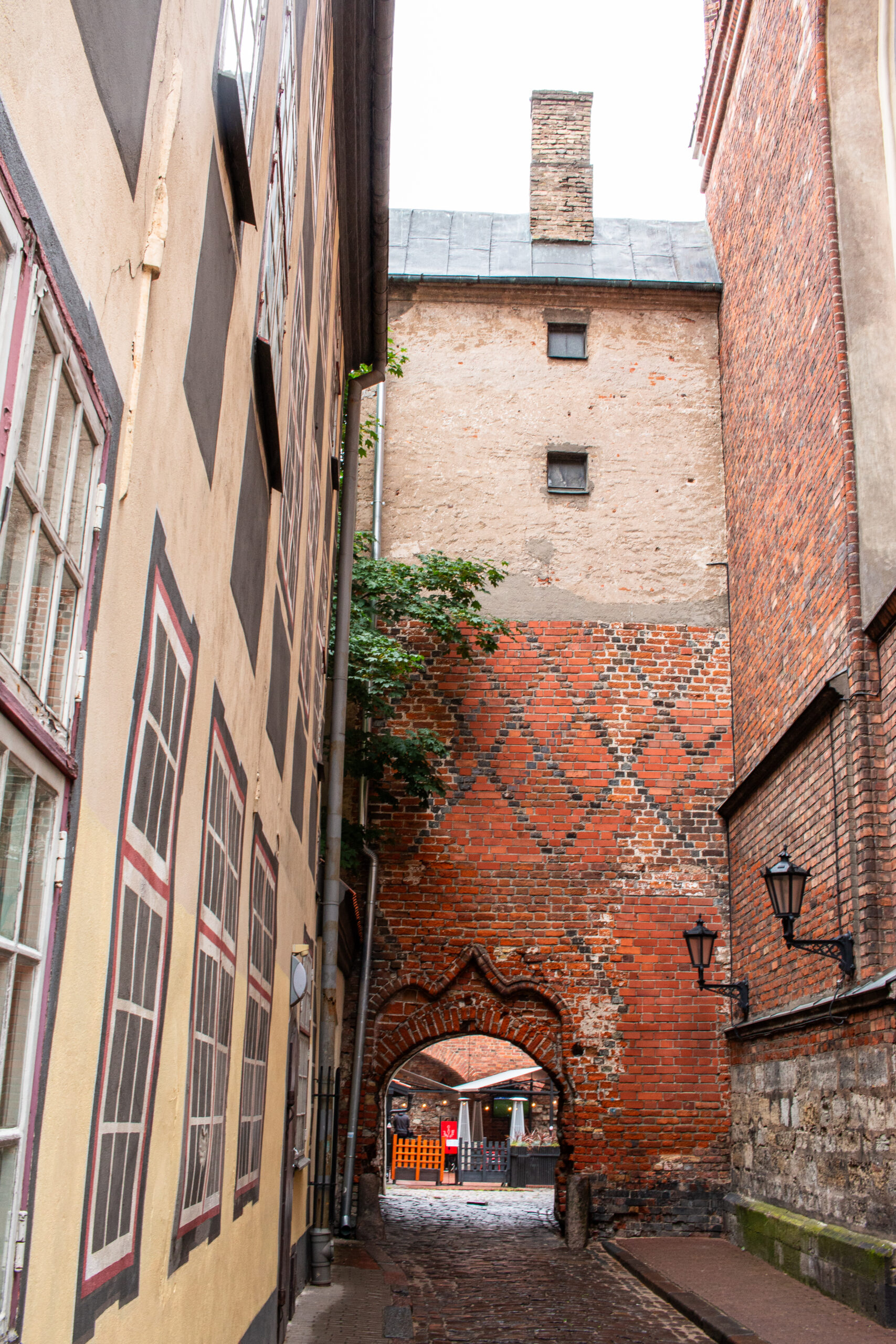 Latvia - Riga - streets adjoined by charming old archways running through buildings 