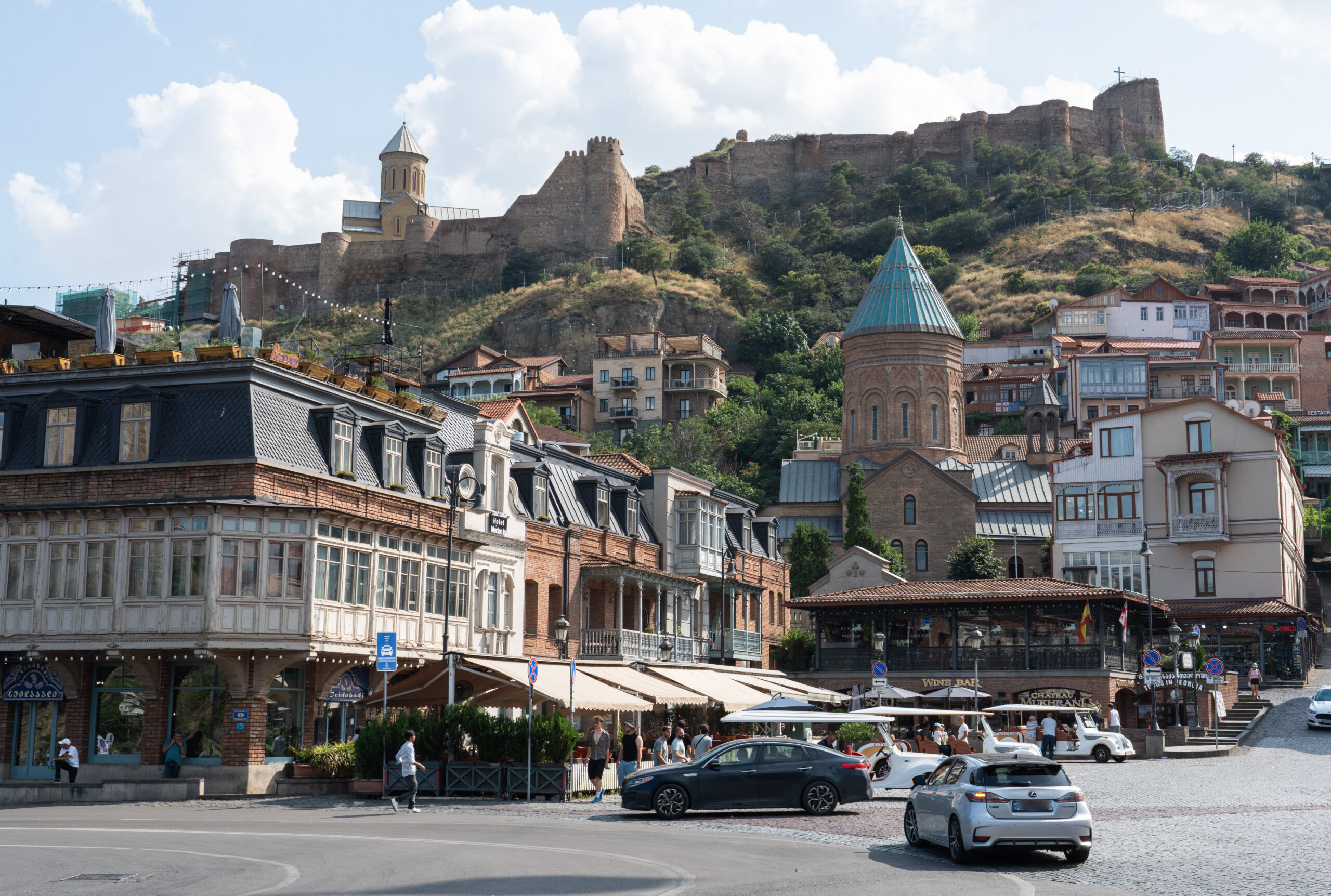 Georgia - Tbilisi -Vakhtang Gorgasali Square with Narikala Fortress and St Nicolas Church above