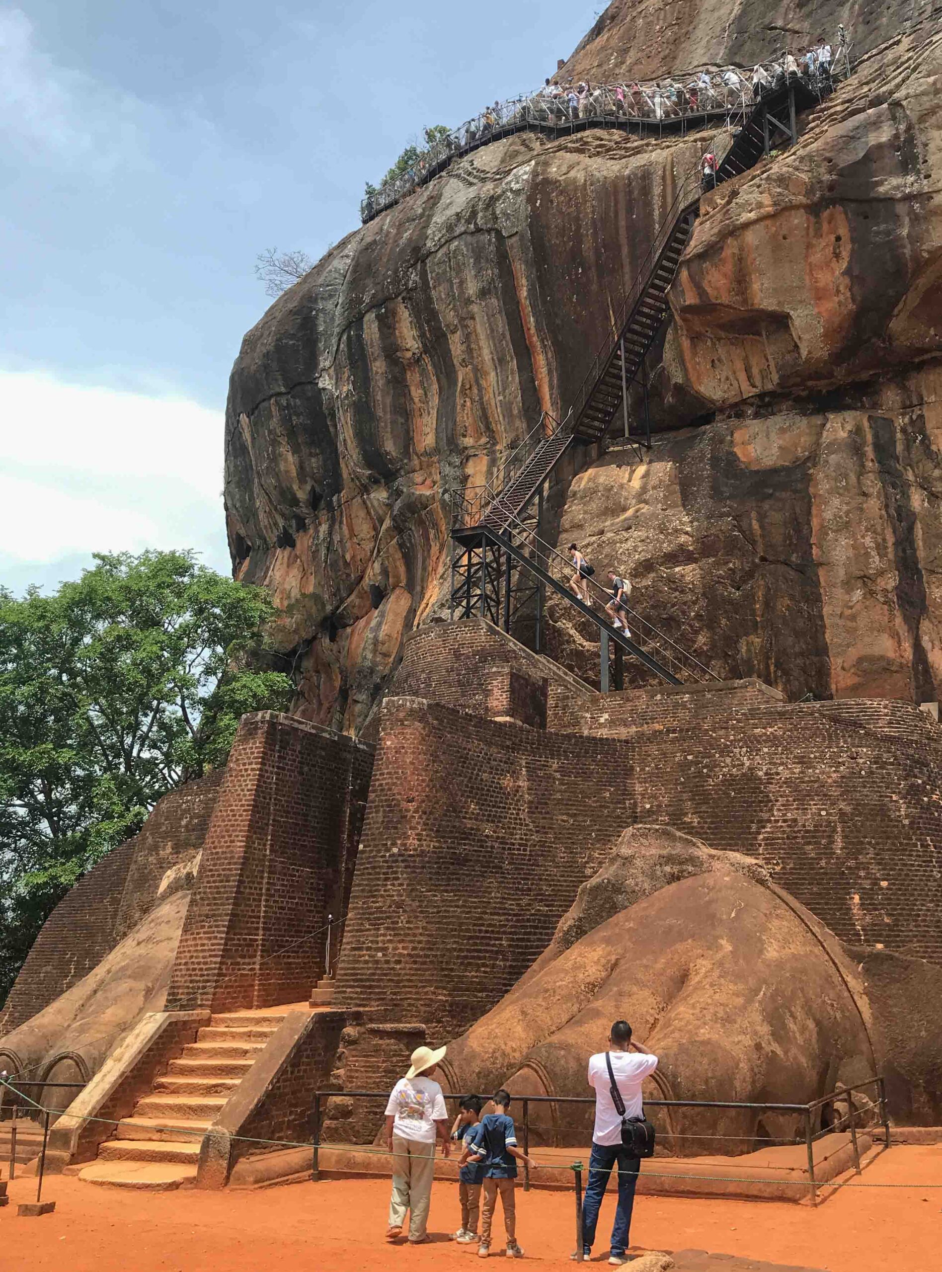 The line of people climbing from the Lion's Paw to the top of the rock
